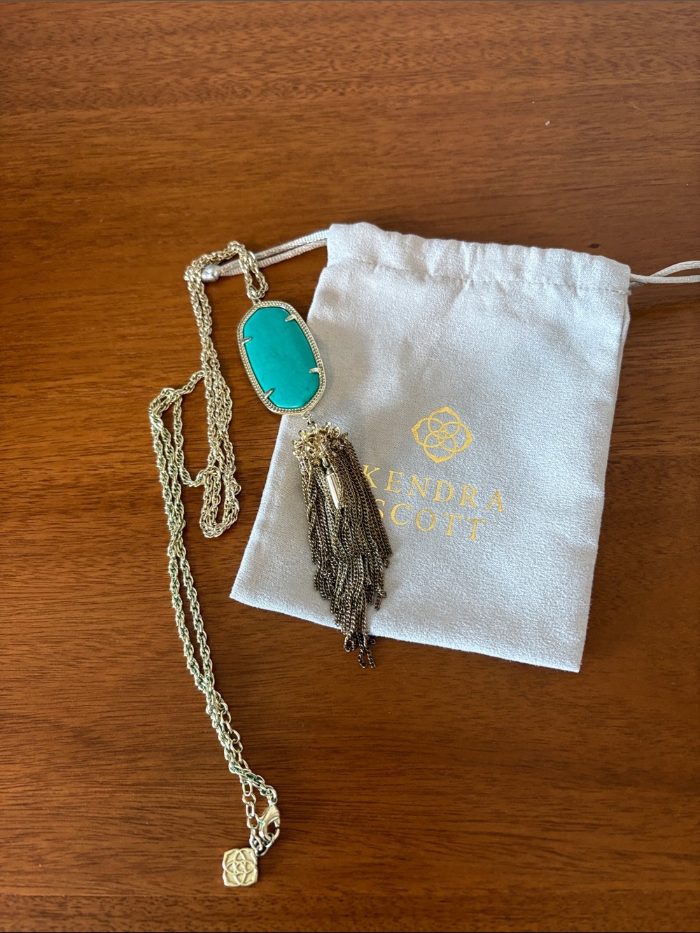 Kendra Scott Gold Necklace with Turquoise Oval Pendant and Tassel